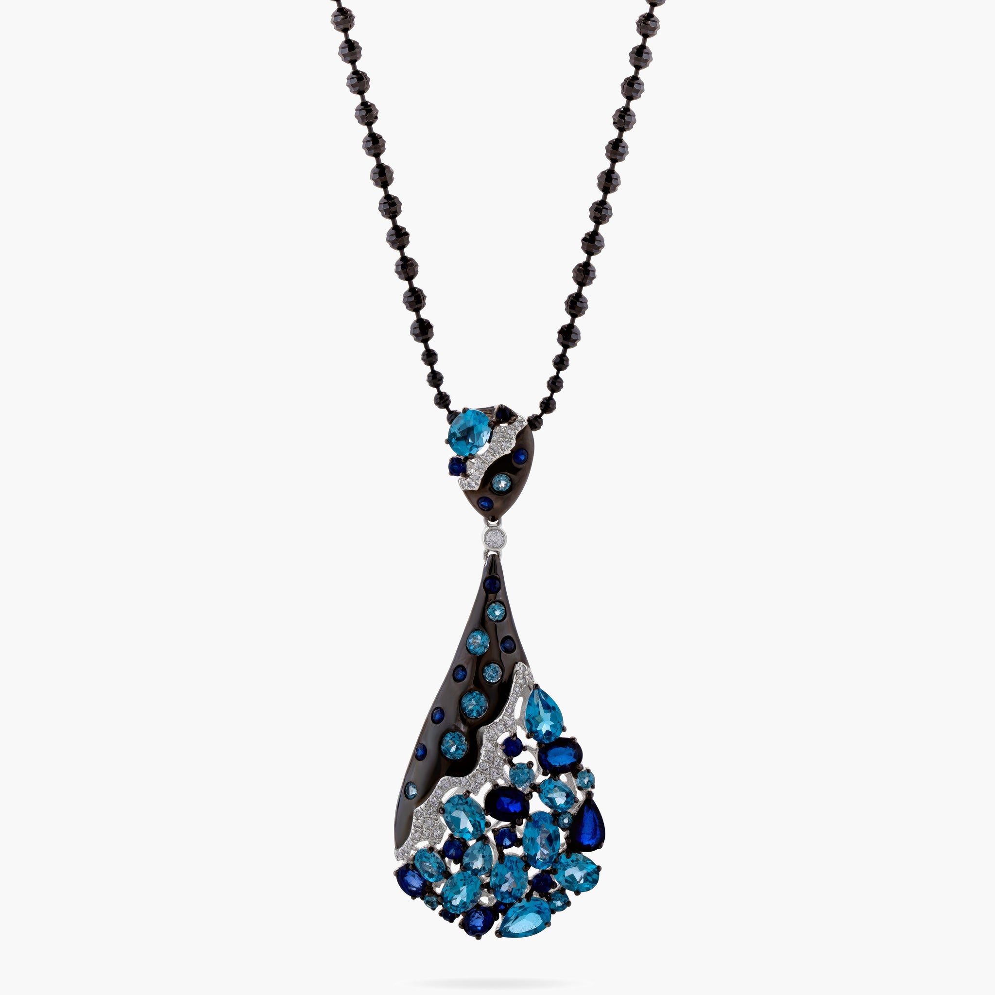 Drop blue topaz and diamond pendant