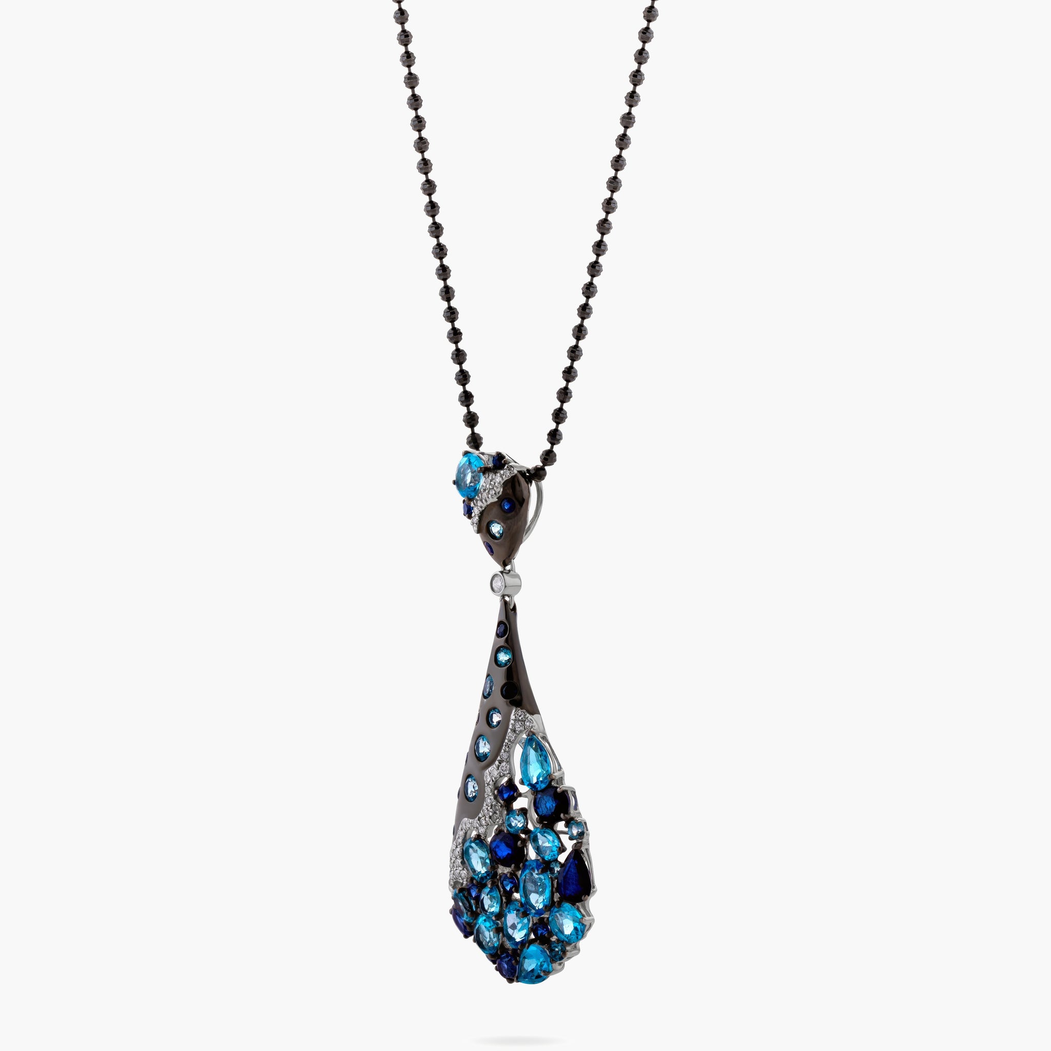 Drop blue topaz and diamond pendant