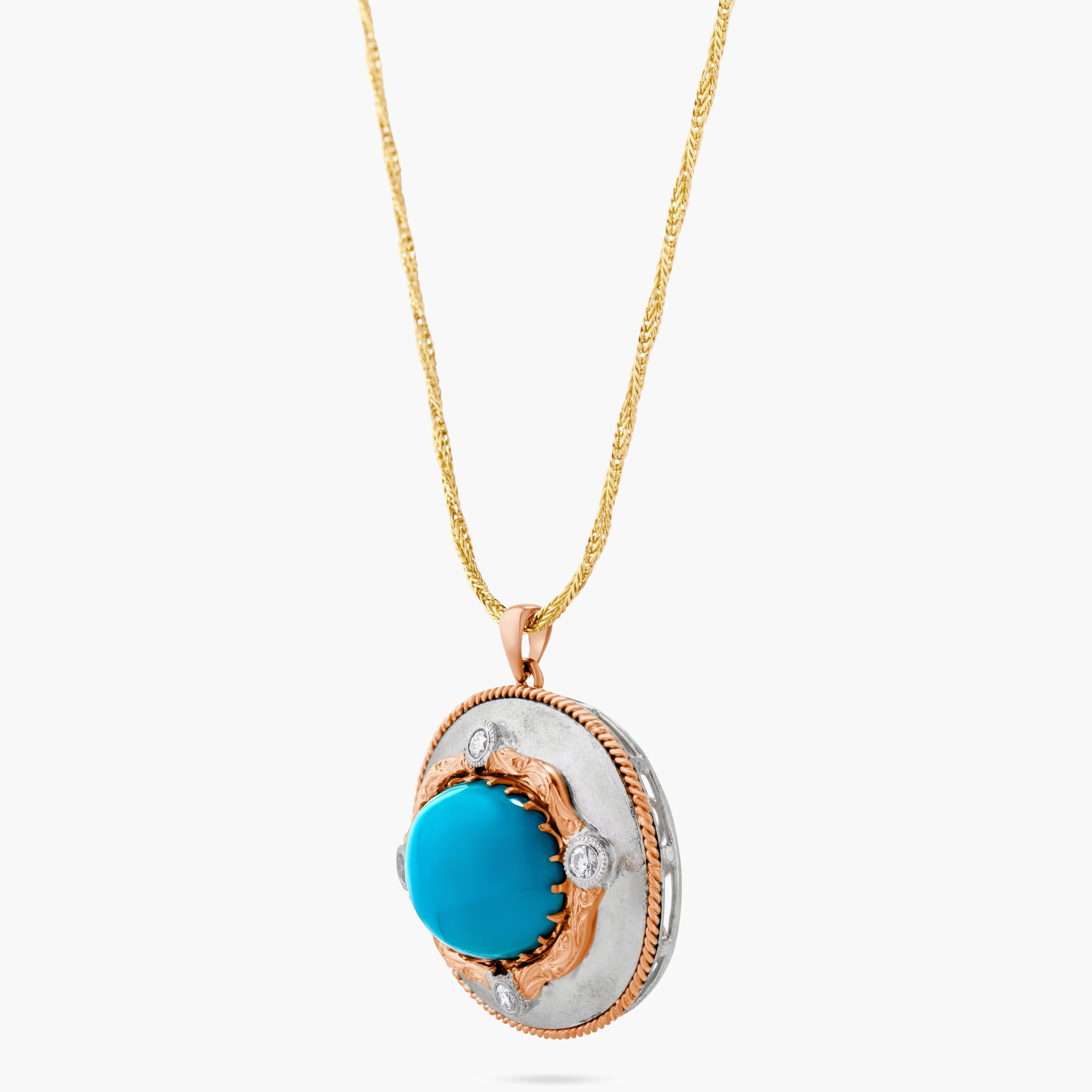 Turquoise and diamond pendant