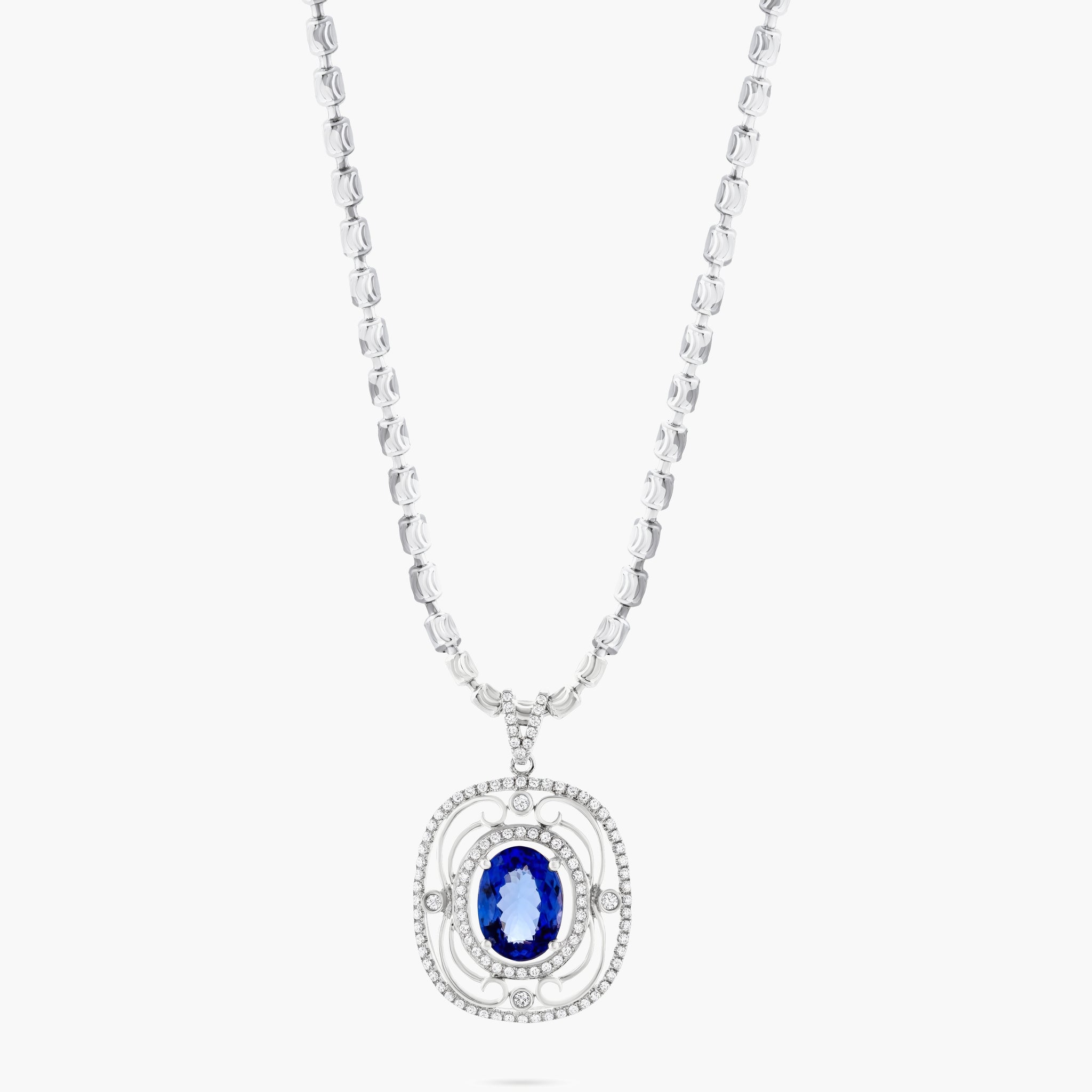 Oval Tanzanite and diamond pendant