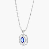 Oval Tanzanite and diamond pendant