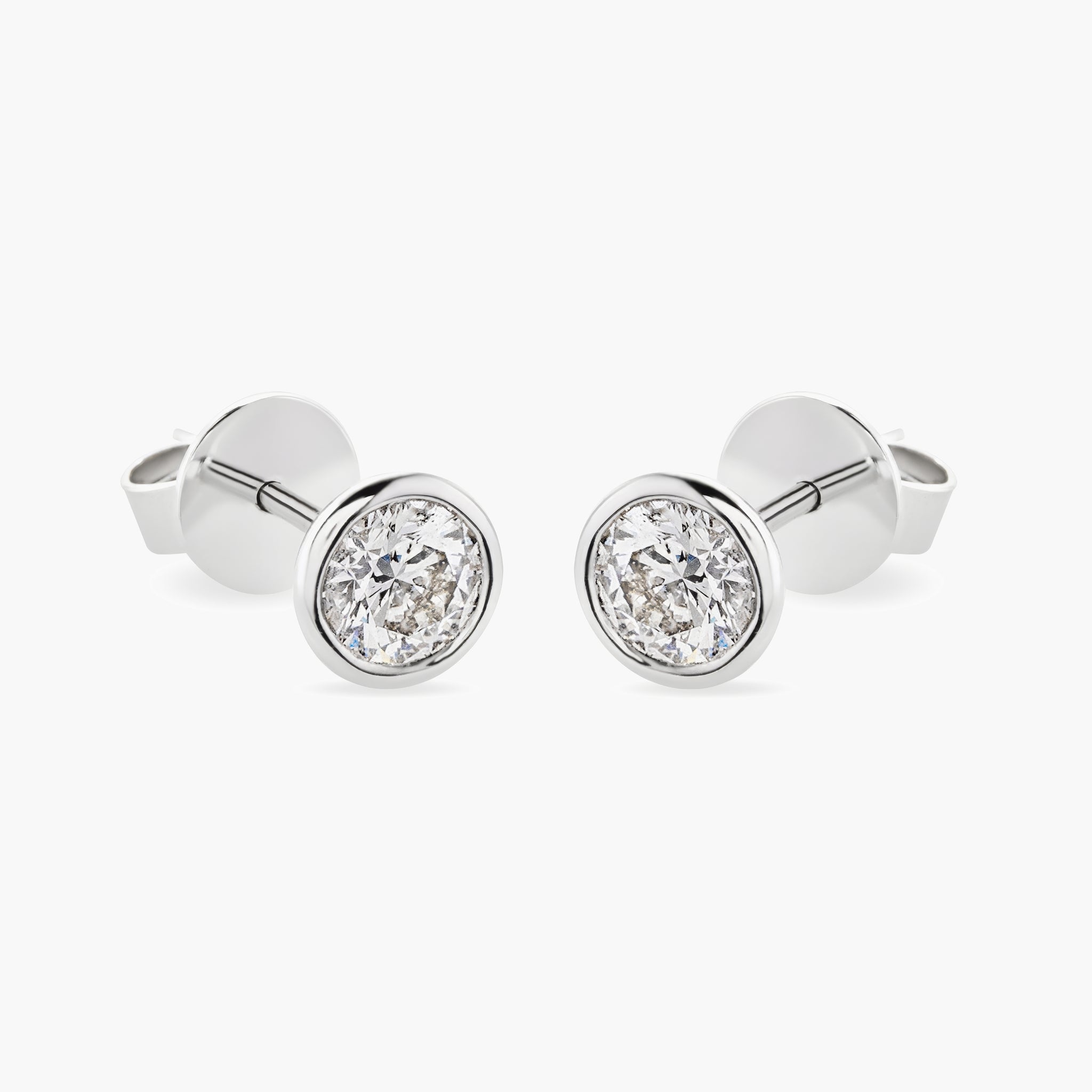 Diamond stud earrings w diam frame