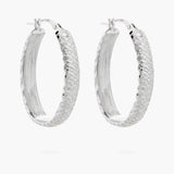 Diamond cut oval hoop earrings