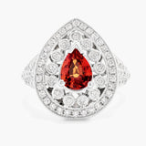 Fancy Pearshape Orange sapphire and diamond ring