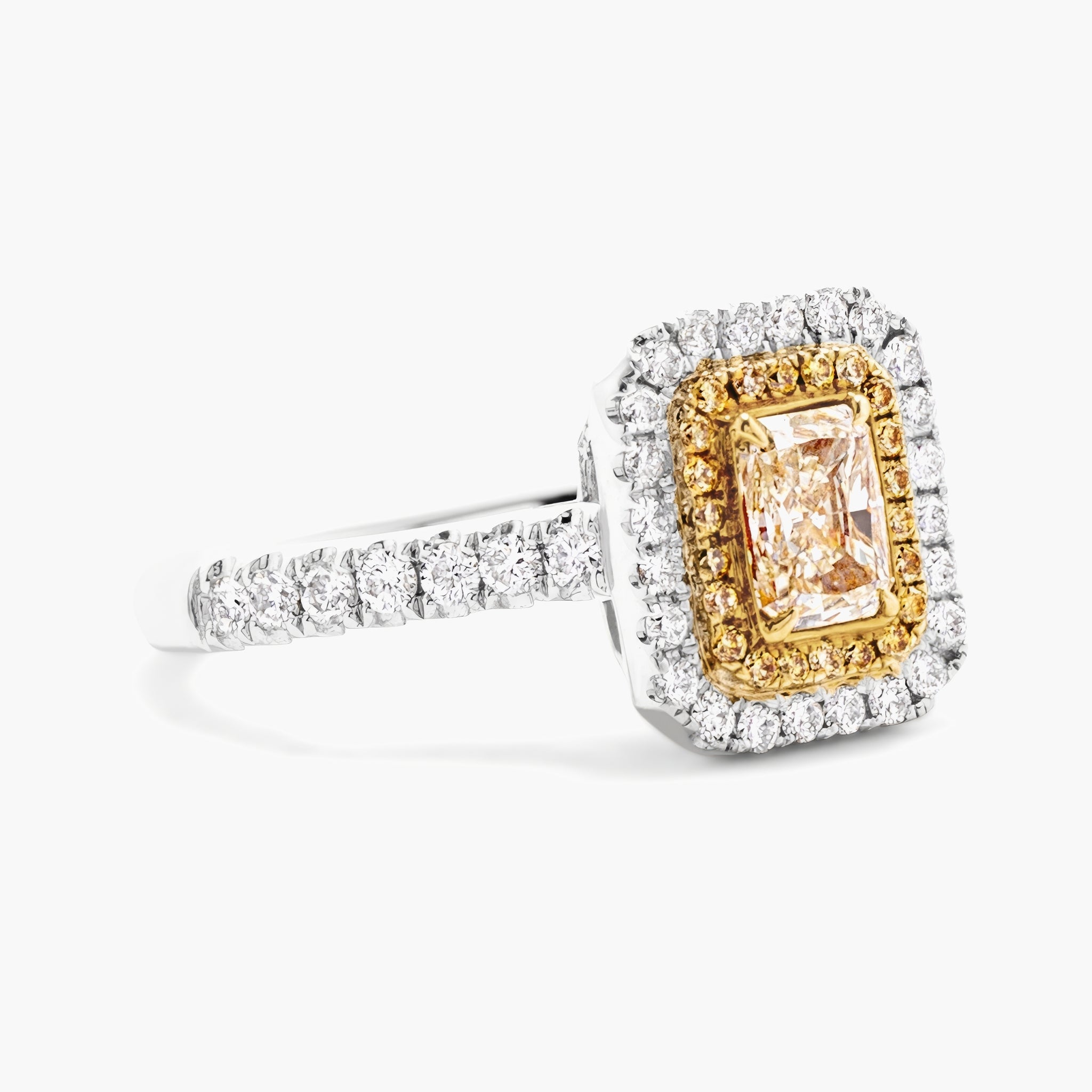 Fancy yellow radiant cut w yellow & white diamond halo